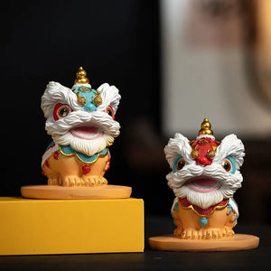The new Chinese trendy resin tea pet of waking lion, Forbidden City fortune-telling tea tray ornament, desktop and living room cultural and creative lion dance entrance decoration.
