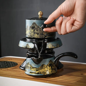 Light luxury automatic tea set with "Thousand Miles of Rivers and Mountains" creative teapot and kung fu tea cups, high-end lazy office teapot.