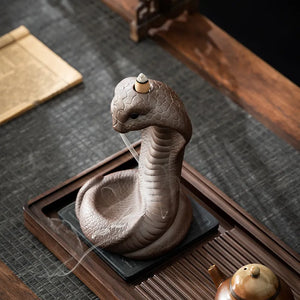 Reverse incense burner, creative ceramic Chinese zodiac snake ornament for incense ceremony with old clay and spirit snake design, suitable for household use with sandalwood and agarwood incense