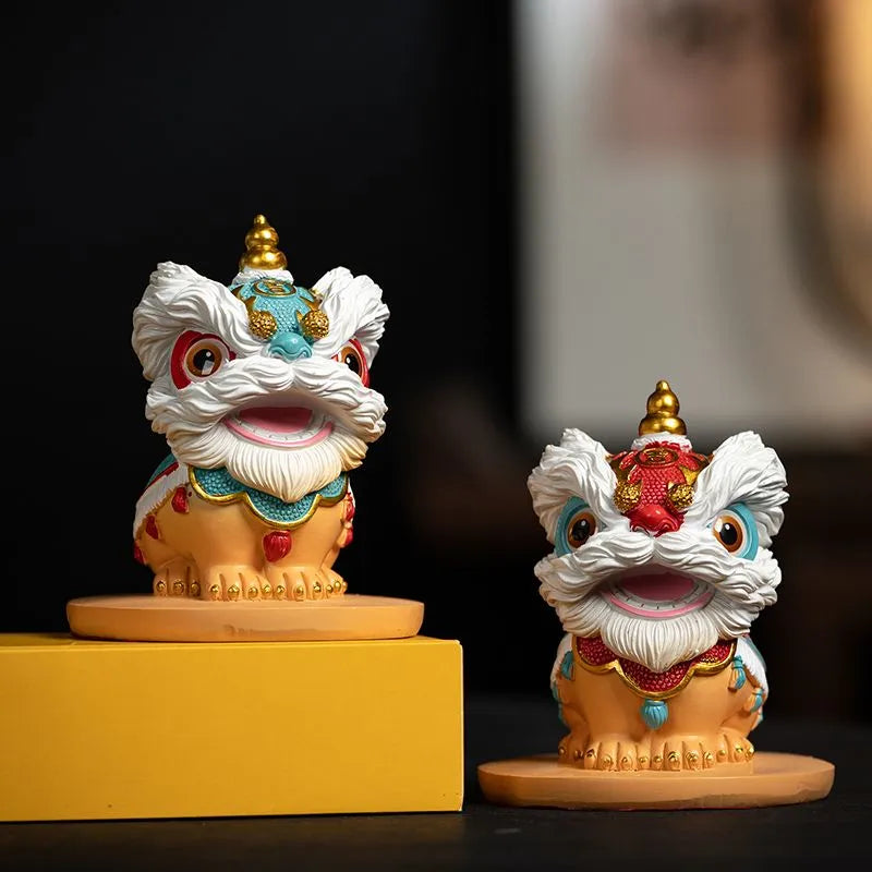 The new Chinese trendy resin tea pet of waking lion, Forbidden City fortune-telling tea tray ornament, desktop and living room cultural and creative lion dance entrance decoration.