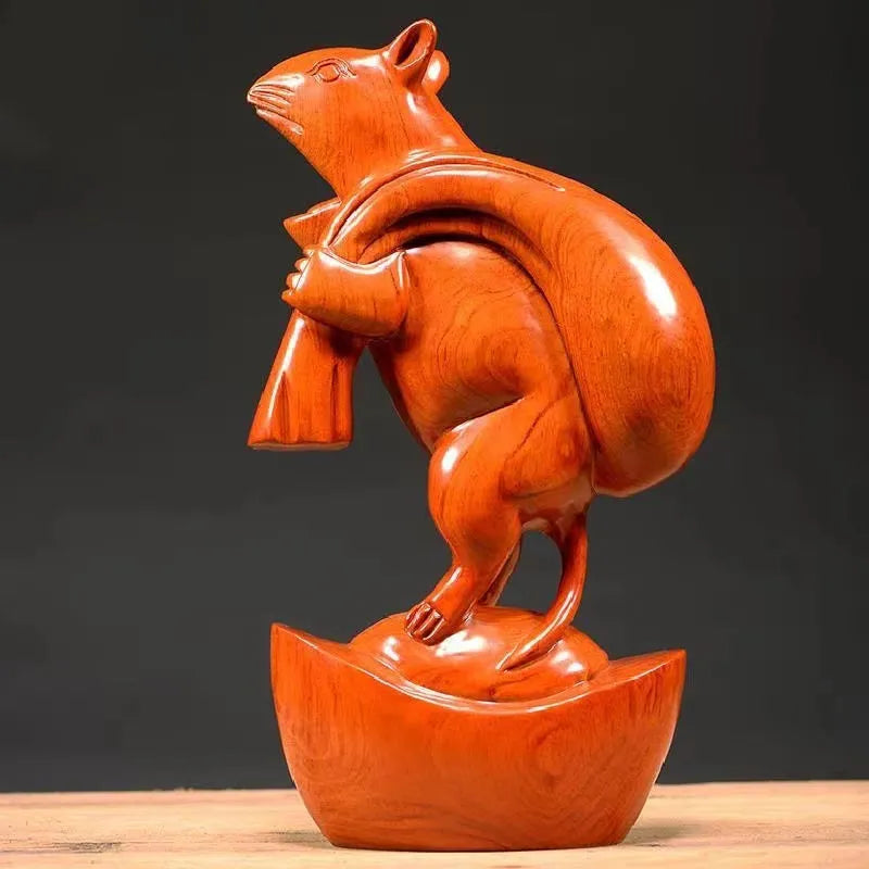 Ebony wood carving rat ornaments, the rat among the twelve Chinese zodiac animals for attracting wealth. They are home decorations for the living room and handicraft gifts made of mahogany.