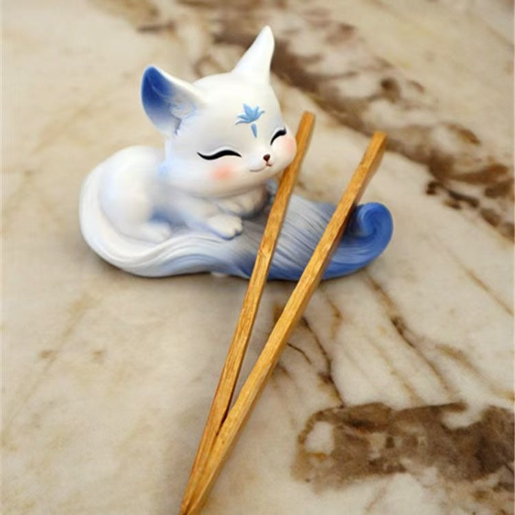 Cute Little Fox Decoration Phone Holder. It's a home decoration item with a cute style. It's a genuine new product in the Chinese style for indoor use.