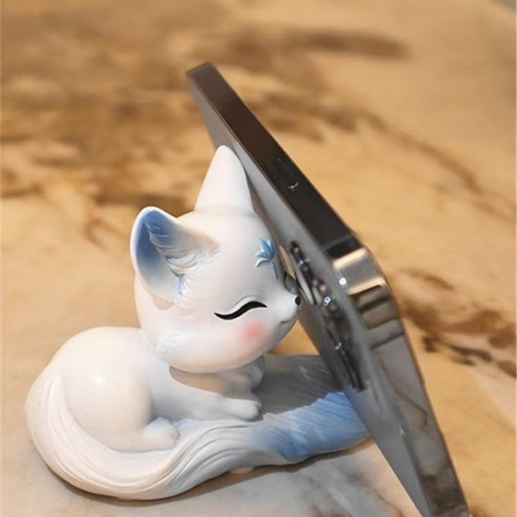 Cute Little Fox Decoration Phone Holder. It's a home decoration item with a cute style. It's a genuine new product in the Chinese style for indoor use.