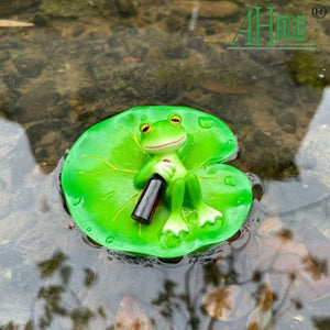 A tipsy frog, a lotus leaf as a bed, a bottle of wine as a companion, a small ornament that brings leisure into life