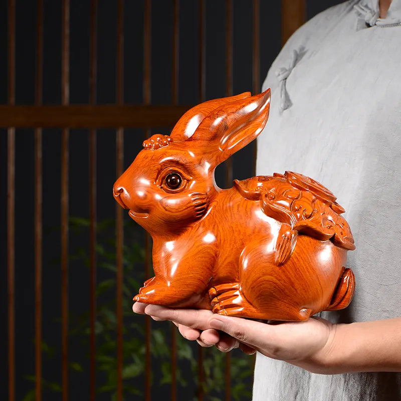 A rabbit woodcarving ornament, a real wood-carved animal of the Chinese zodiac, a handicraft gift for home, study, office desktop and girlfriend.