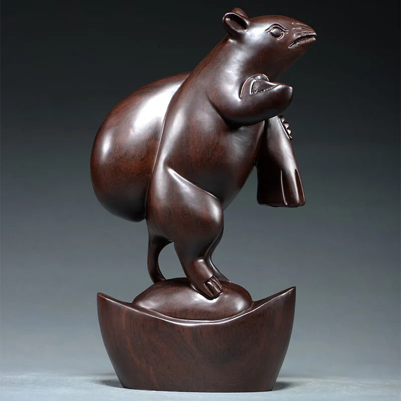 Ebony wood carving rat ornaments, the rat among the twelve Chinese zodiac animals for attracting wealth. They are home decorations for the living room and handicraft gifts made of mahogany.