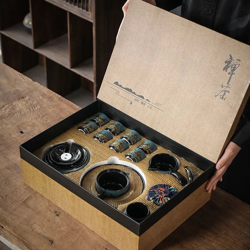 Light luxury automatic tea set with "Thousand Miles of Rivers and Mountains" creative teapot and kung fu tea cups, high-end lazy office teapot.