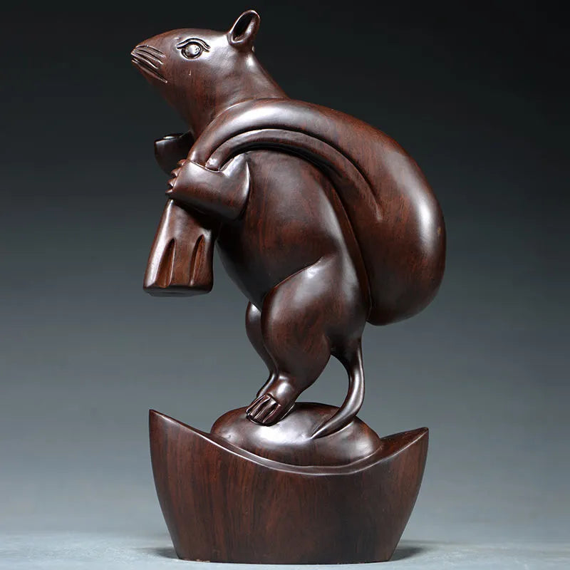 Ebony wood carving rat ornaments, the rat among the twelve Chinese zodiac animals for attracting wealth. They are home decorations for the living room and handicraft gifts made of mahogany.