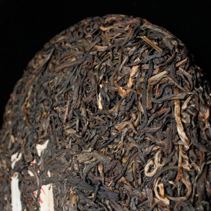 A 357g Pu'er raw tea cake of 14-year-old aged material pressed private ancient tea from Menghai Banzhang tea area