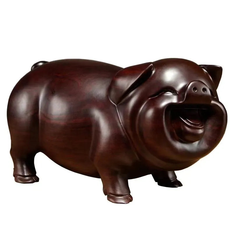 Pear wood carving of the pig, redwood and ebony wood carvings of the pig among the twelve Chinese zodiac animals for attracting wealth. They are tabletop birthday gifts, the lucky golden pig ornaments.