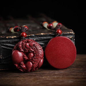 Fortune - enhancing and Wealth - attracting Cinnabar Pixiu Pendant. The responsive Pixiu hanging ornament is a lucky - turning accessory suitable for both men and women, made of purple cinnabar Ornaments