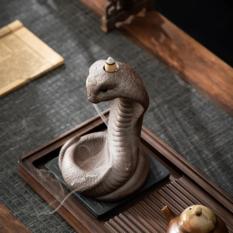 Reverse incense burner, creative ceramic Chinese zodiac snake ornament for incense ceremony with old clay and spirit snake design, suitable for household use with sandalwood and agarwood incense