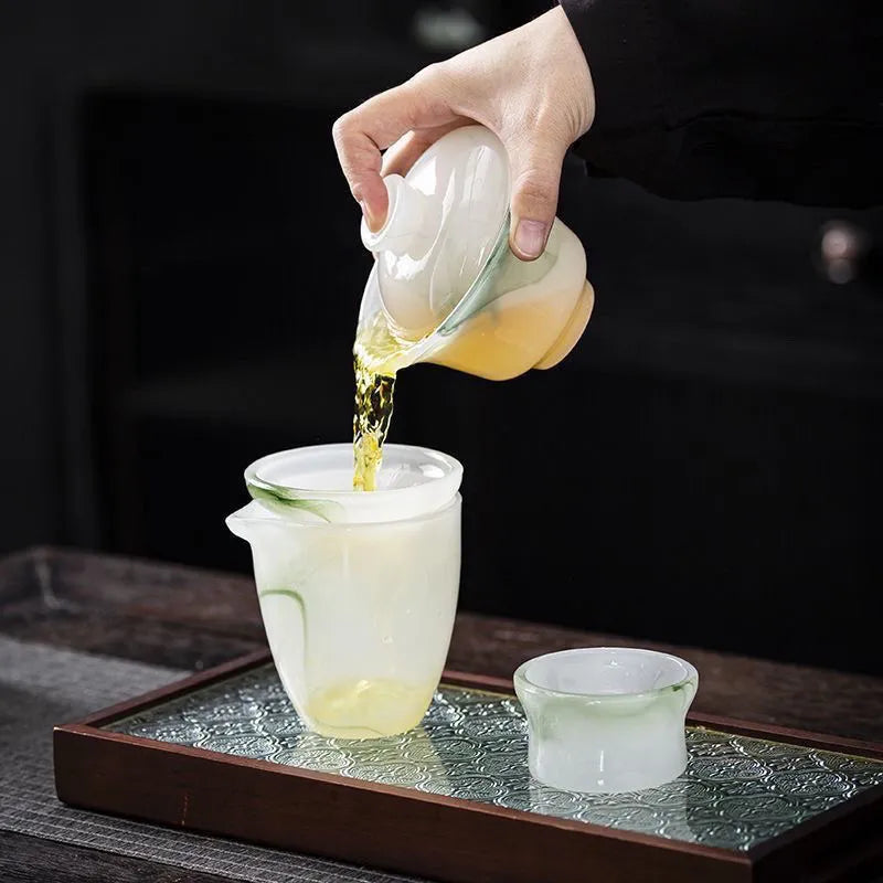High-end light luxury jade porcelain ink wash glass tea set, kung fu tea cups, office white jade, household and gift-giving covered bowl